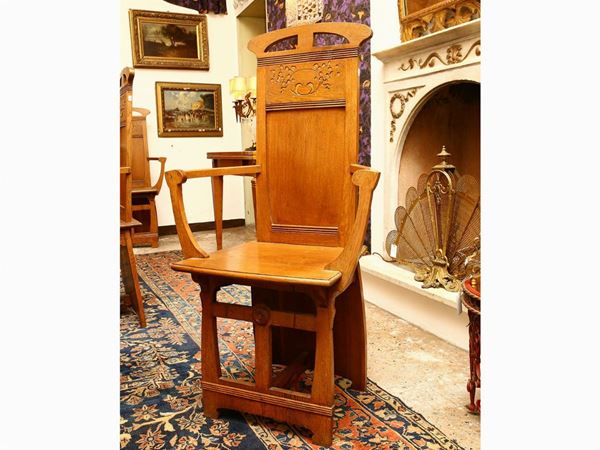 Series of six Art Nouveau armchairs in oak