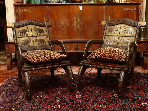 Pair of exotic teak armchairs
