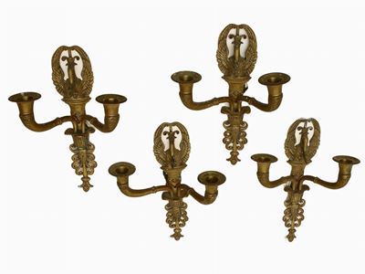 Serie di Quattro Appliques in Bronzo