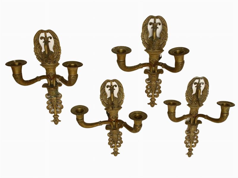 Serie di Quattro Appliques in Bronzo