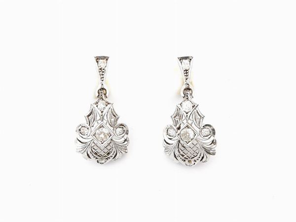 White gold pendant earrings with diamonds
