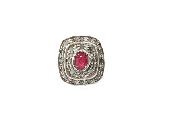 9Kt gold and rhodium-plated silver with diamonds and ruby