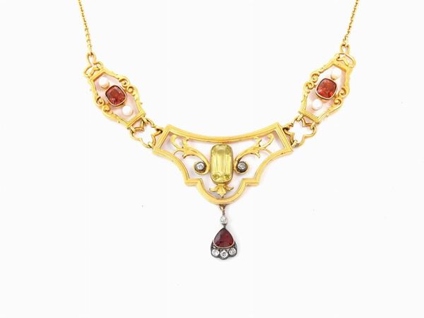 14Kt yellow gold and silver necklace with diamonds, heliodor beryl, garnets and pearls