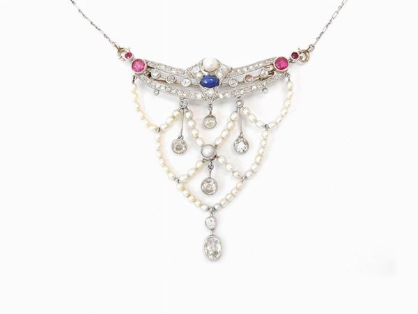 Choker brooch in platinum and white gold with diamonds, rubies, sapphire and pearls