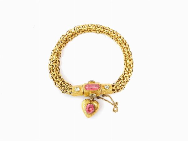 Low alloy yellow gold bracelet with coated pink topazes and foil backed chrysoberyls