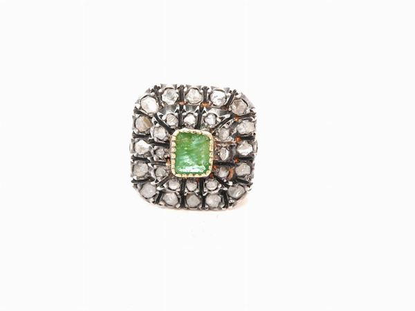 Yellow gold and silver ring with diamonds and emerald