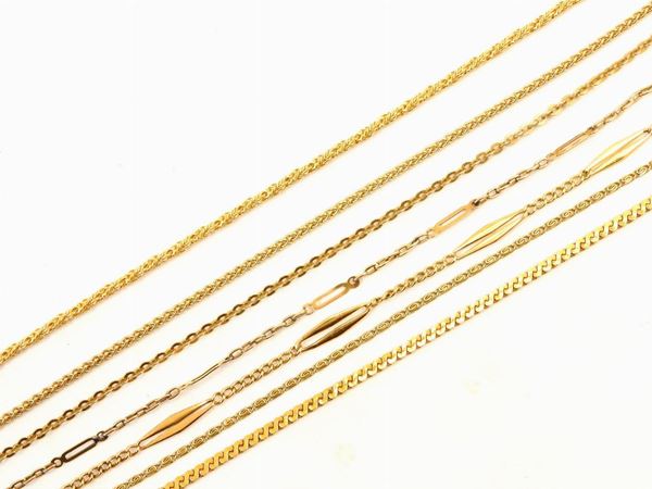 Seven little chains in yellow gold