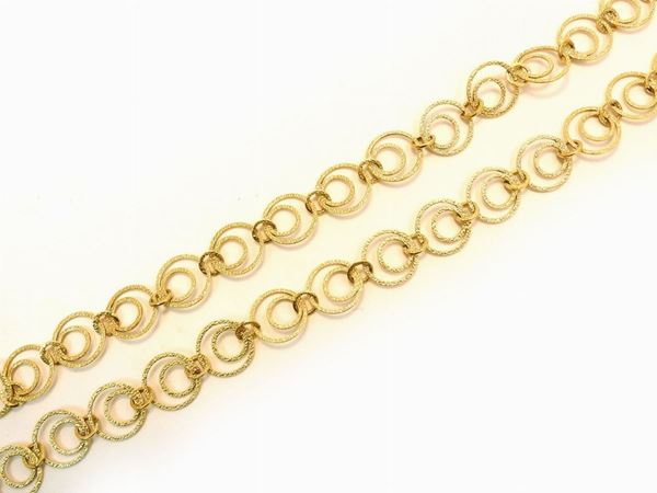 Long yellow gold necklace