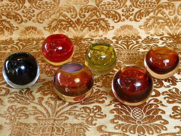 Set of six glass candle holders