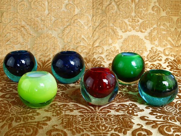 Set of six glass candle holders