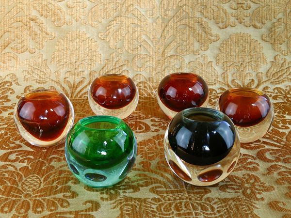 Set of six glass candle holders