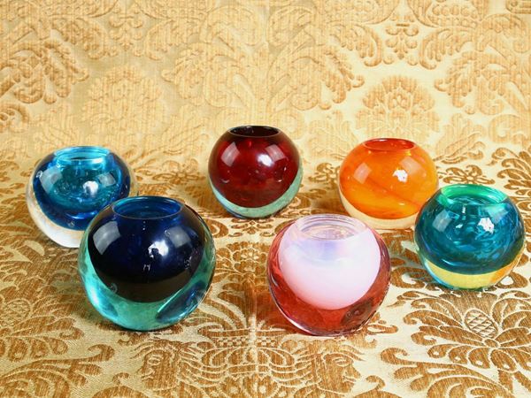 Set of six glass candle holders