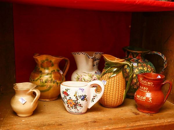 Seven earthenware jugs