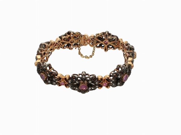 Yellow gold and silver bracelet with diamonds and rubies