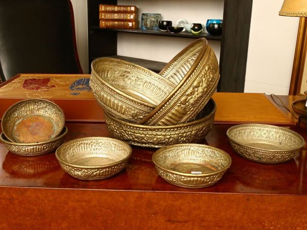 Series of thirteen oriental bowls in embossed tole