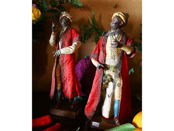 Coppia di figure da presepe in terracotta dipinta