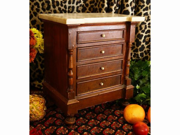 Model of chest of drawers in walnut veneer