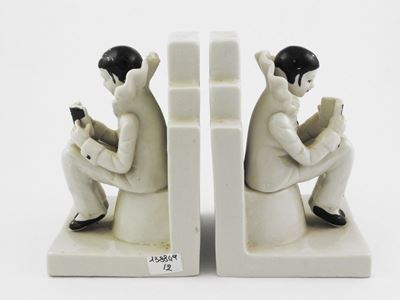 Coppia di Reggilibri in Ceramica