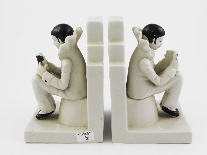 Coppia di Reggilibri in Ceramica