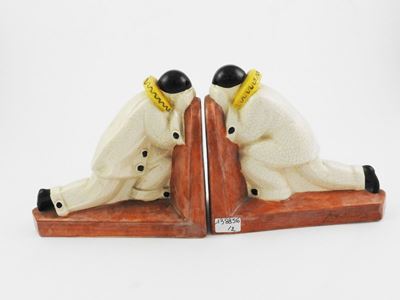 Coppia di Reggilibri in Ceramica