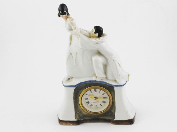 Table clock in polychrome porcelain