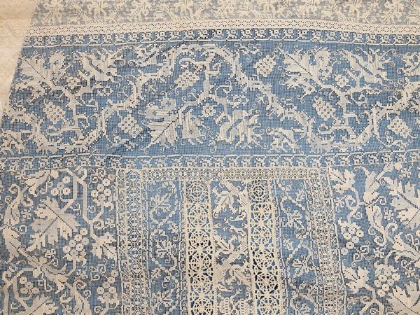 Needle-embroidered ivory cotton and light blue silk bedspread