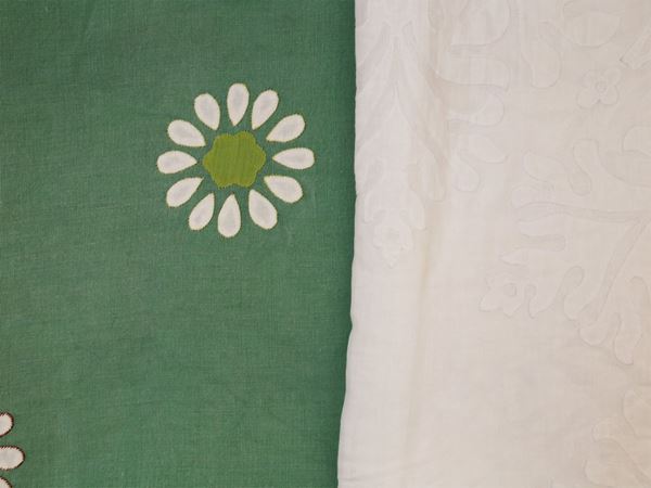 Two green linen and white fine linen tablecloths
