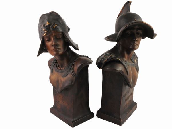 Coppia di busti in terraglia patinata ad imitazione del bronzo Cherc per Goldscheider