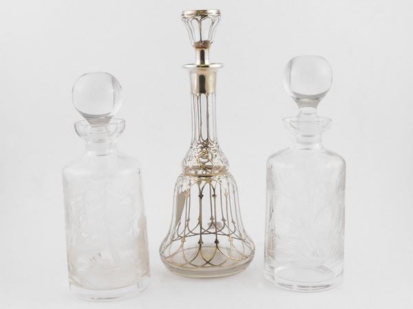 Three crystal liqueur bottles