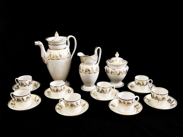 Porcelain coffee set heightened in gold