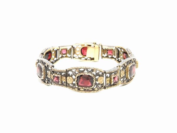 Pink gold and silver bracelet with garnets