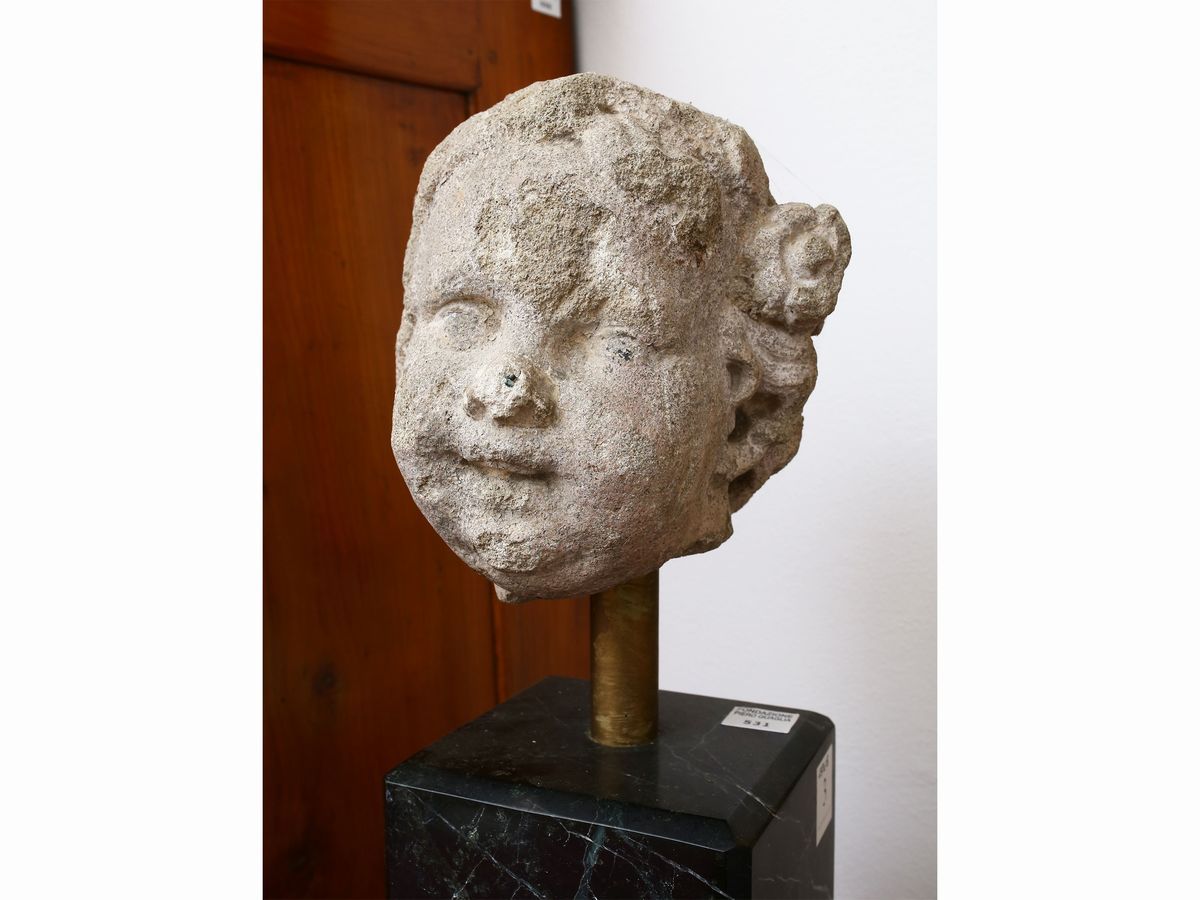 Testa di Putto in Pietra Serena
