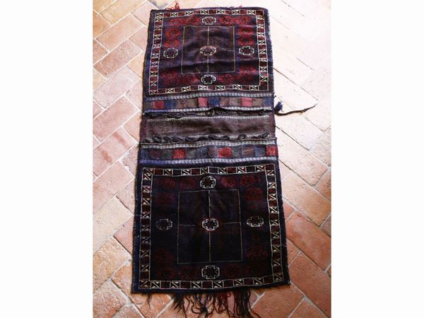 Tre tappeti coprisella di vecchia manifattura