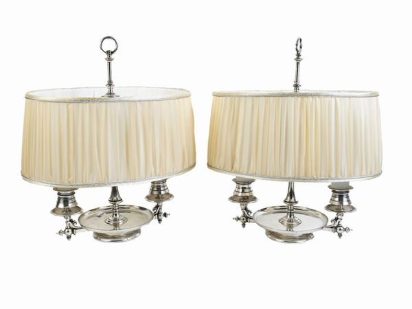 Pair of table lamps in silver metal