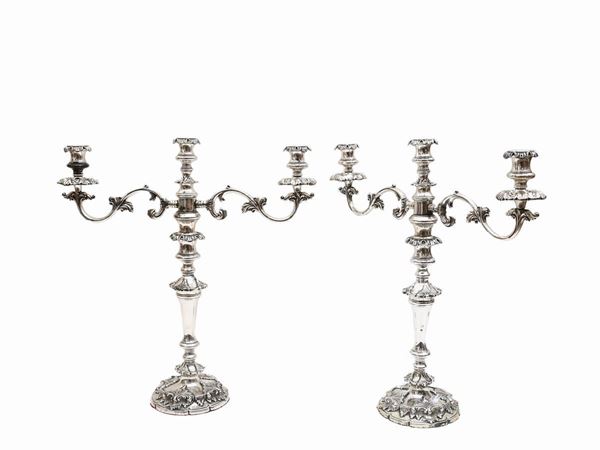 Pair of large silver-plated metal candlesticks