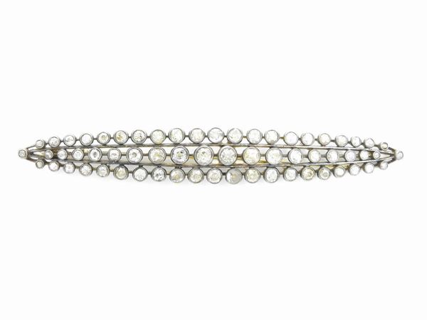 Yellow gold  and silver bar brooch with diamonds