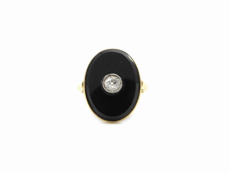 Anello in Oro Giallo con Diamante e Onice
