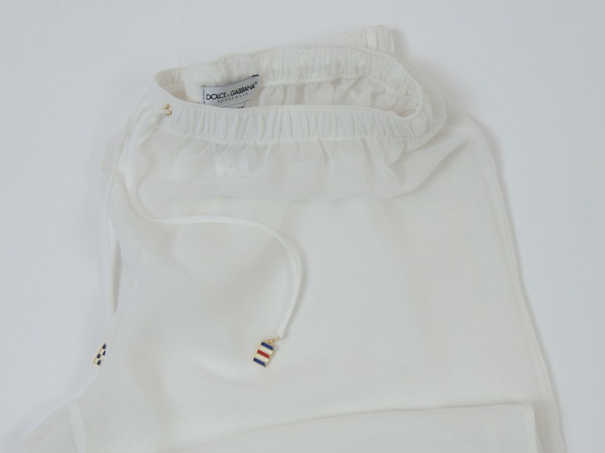 Blusa in Seta e Pantaloni in Viscosa, Saint Laurent e Dolce Gabbana