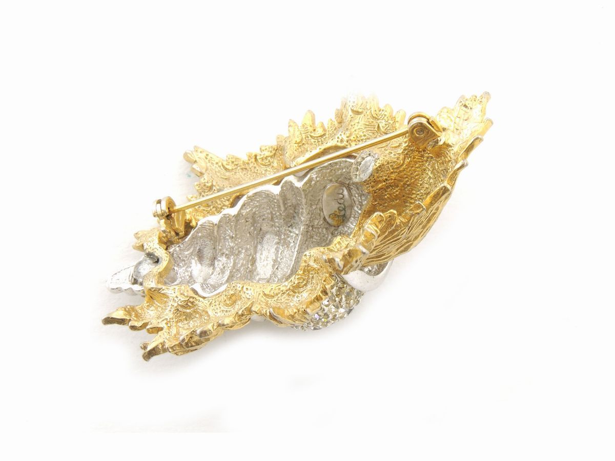Due Spille in Metallo Dorato e Strass