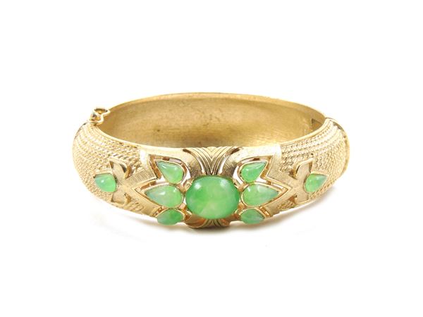 Golden metal and green glass bangle bracelet, Trifari