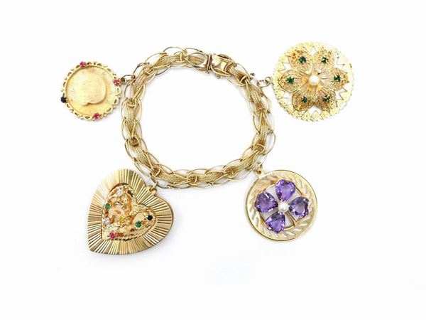 14Kt yellow gold bracelet with four pendants with amethyst quartzes, pearl and synthetic gems