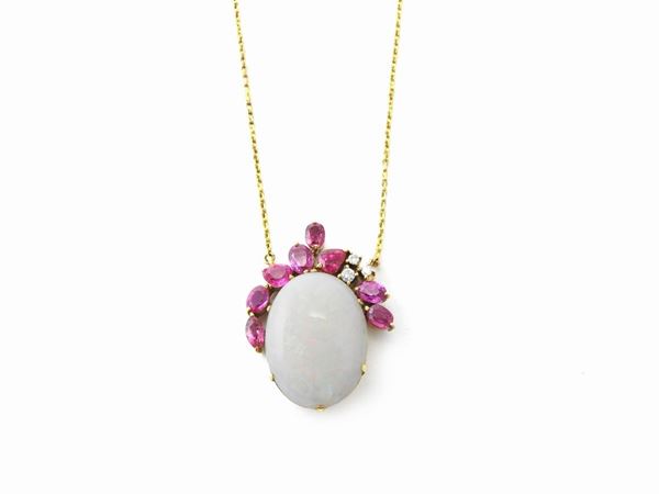 14Kt little chain and pendant with rubies and noble white opal