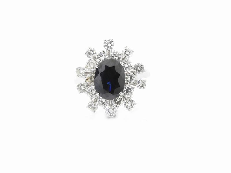 Anello in Oro Bianco con Diamanti e Zaffiro