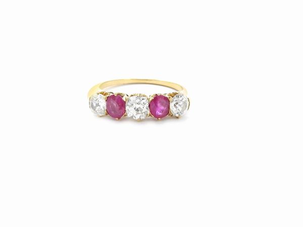Yellow gold ring with diamonds and rubies