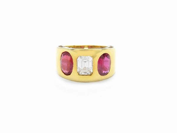 Yellow gold band ring with diamond and rubies