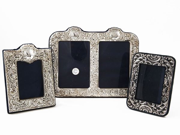 Tre cornici porta foto rivestite in argento