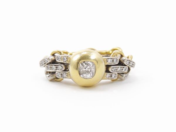 Soft band ring in white and yellow gold with diamonds