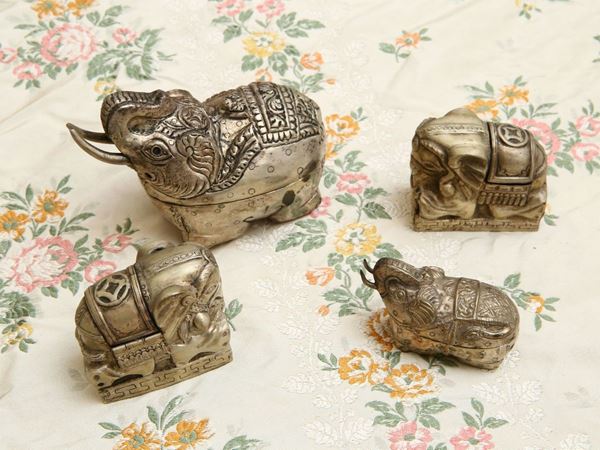 Four small silver animalier boxes