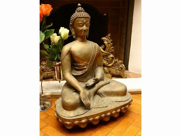 Sitting Buddha in gilded metal