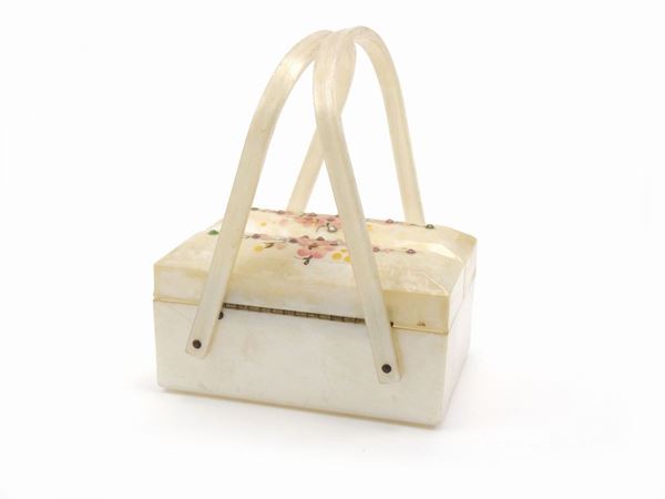 Handbag in mother of pearl lucite